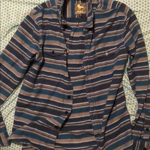 This is a striped button up shirt.